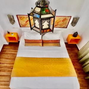 Postel nebo postele na pokoji v ubytování Apartamentos Puerta Real Sevilla