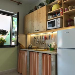 Kuchyňa alebo kuchynka v ubytovaní Adriana casa vacanze mare Etna Sicilia