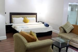 Ένα ή περισσότερα κρεβάτια σε δωμάτιο στο BW Starfire Hotel