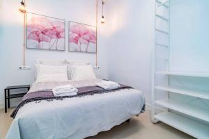 Postel nebo postele na pokoji v ubytování Exclusivo Apartamento en Chamberí Fernando El Católico by Batuecas