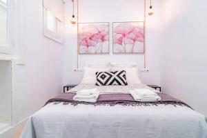 Postel nebo postele na pokoji v ubytování Exclusivo Apartamento en Chamberí Fernando El Católico by Batuecas