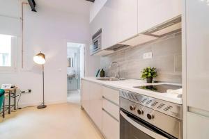 Kuchyň nebo kuchyňský kout v ubytování Exclusivo Apartamento en Chamberí Fernando El Católico by Batuecas + 14 fotografií