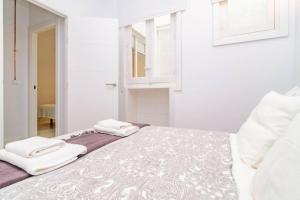 Postel nebo postele na pokoji v ubytování Exclusivo Apartamento en Chamberí Fernando El Católico by Batuecas