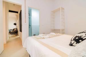 Postel nebo postele na pokoji v ubytování Exclusivo Apartamento en Chamberí Fernando El Católico by Batuecas