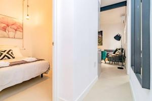 Postel nebo postele na pokoji v ubytování Exclusivo Apartamento en Chamberí Fernando El Católico by Batuecas