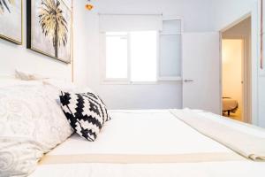 Postel nebo postele na pokoji v ubytování Exclusivo Apartamento en Chamberí Fernando El Católico by Batuecas