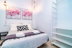 Postel nebo postele na pokoji v ubytování Exclusivo Apartamento en Chamberí Fernando El Católico by Batuecas