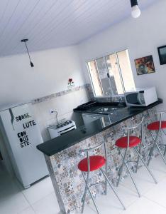 Kjøkken eller kjøkkenkrok på Recanto da Nice