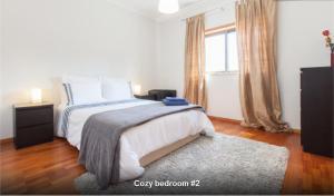 a bedroom with a large bed and a window at Midway to Geres and Braga in Amares