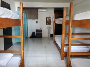 Postel nebo postele na pokoji v ubytování Downtown Hostel Chetumal