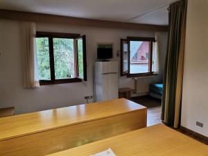 A television and/or entertainment centre at Residence Tarvisio Camporosso
