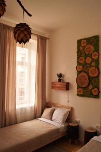 Postel nebo postele na pokoji v ubytování DABA Mini Hotel + 12 fotografií
