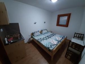 Postel nebo postele na pokoji v ubytování Guest House Vukicevic