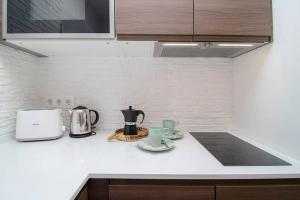 Küche/Küchenzeile in der Unterkunft Deslumbrante Apartamento en Plaza España, by Batuecas