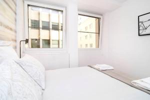 Ein Bett oder Betten in einem Zimmer der Unterkunft Deslumbrante Apartamento en Plaza España, by Batuecas