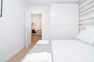 Ein Bett oder Betten in einem Zimmer der Unterkunft Deslumbrante Apartamento en Plaza España, by Batuecas