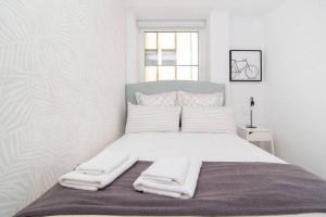 Ein Bett oder Betten in einem Zimmer der Unterkunft Deslumbrante Apartamento en Plaza España, by Batuecas