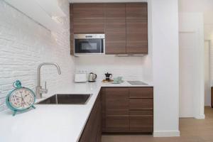 Küche/Küchenzeile in der Unterkunft Deslumbrante Apartamento en Plaza España, by Batuecas