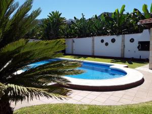 The swimming pool at or near Casita La Finca II