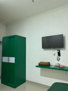 TV o dispositivi per l'intrattenimento presso Anugrah Inn