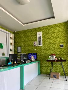 Cucina o angolo cottura di Anugrah Inn