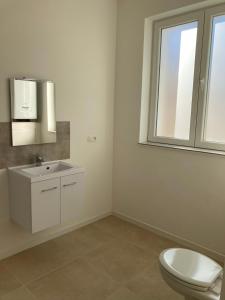 Koupelna v ubytování Dreamland Apartments EU, Brussels + 52 fotografií