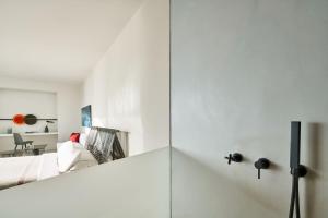 Letto o letti in una camera di Alti Santorini Suites - Caldera View