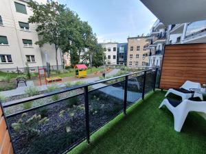 Vonkajšia záhrada v ubytovaní Apartament 56