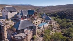 an aerial view of a large house with at White Lion Lodge on Sanbona in Montagu