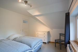 Postel nebo postele na pokoji v ubytování Grand appartement Marie-Thérèse