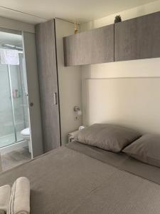 Postel nebo postele na pokoji v ubytování Mobile home Istra BI VILLAGE