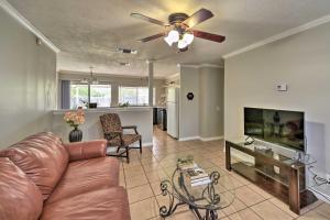a living room with a couch and a ceiling fan at Cozy San Antonio Family Home 3 Mi to Lackland AFB in San Antonio