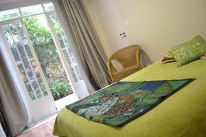 Cama ou camas em um quarto em Zen Hotel Brasil