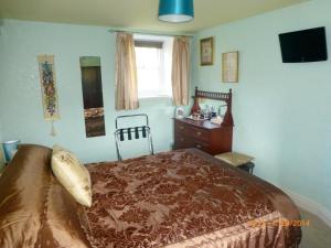 Postel nebo postele na pokoji v ubytování Hazels Roost B&B