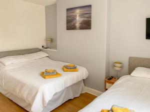 Postel nebo postele na pokoji v ubytování Lisboa