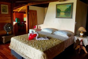 Llit o llits en una habitació de TerrAmor Amazon
