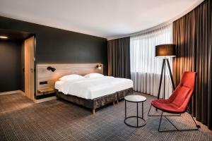 Łóżko lub łóżka w pokoju w obiekcie Park Inn by Radisson Krakow