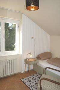 Postel nebo postele na pokoji v ubytování Haus Bregenz Apartment Bodensee