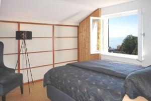 Postel nebo postele na pokoji v ubytování Haus Bregenz Apartment Bodensee