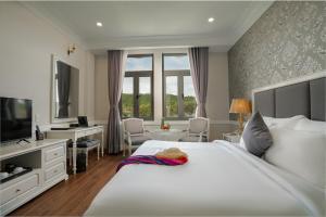 Postel nebo postele na pokoji v ubytování AVS Hotel Phu Quoc