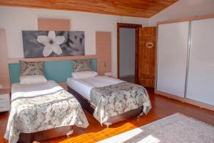 Cama o camas de una habitación en Avena Mountain Boutique Hotel - Adults Only