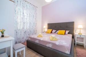 Posteľ alebo postele v izbe v ubytovaní Old Town Top Spot Apartments