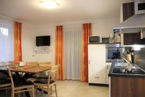 Kuchyňa alebo kuchynka v ubytovaní Flattach Apartment 3