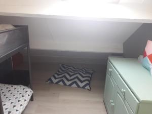 Ein Bett oder Betten in einem Zimmer der Unterkunft Cottage à Merlimont plage