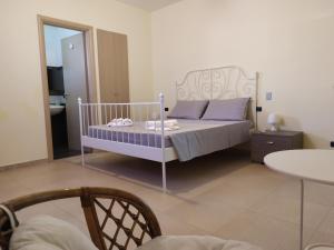A bed or beds in a room at Vossìgnuria