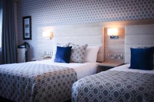 Voodi või voodid majutusasutuse Kiltimagh Park Hotel toas