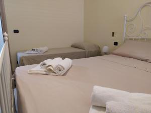 A bed or beds in a room at Vossìgnuria