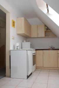 Kuchyňa alebo kuchynka v ubytovaní Apartment Siofok 18