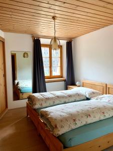 Katil atau katil-katil dalam bilik di Chasa Nogler - Ferienwohnung