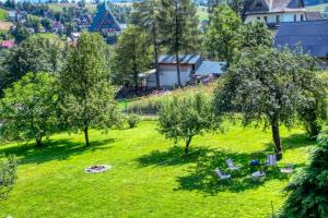 Vonkajšia záhrada v ubytovaní Apartament Góralska Ostoja prywatne wejście widok na Tatry